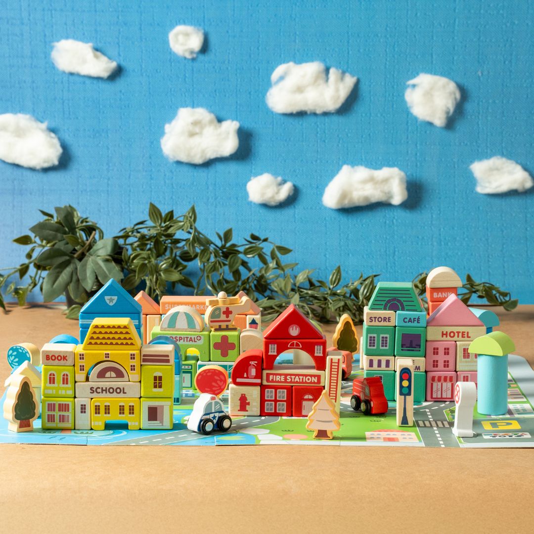 NESTA TOYS - Wooden city building blocks toy set with 115 colorful eco-friendly pieces including buildings, vehicles, trees, and road signals for kids creative play