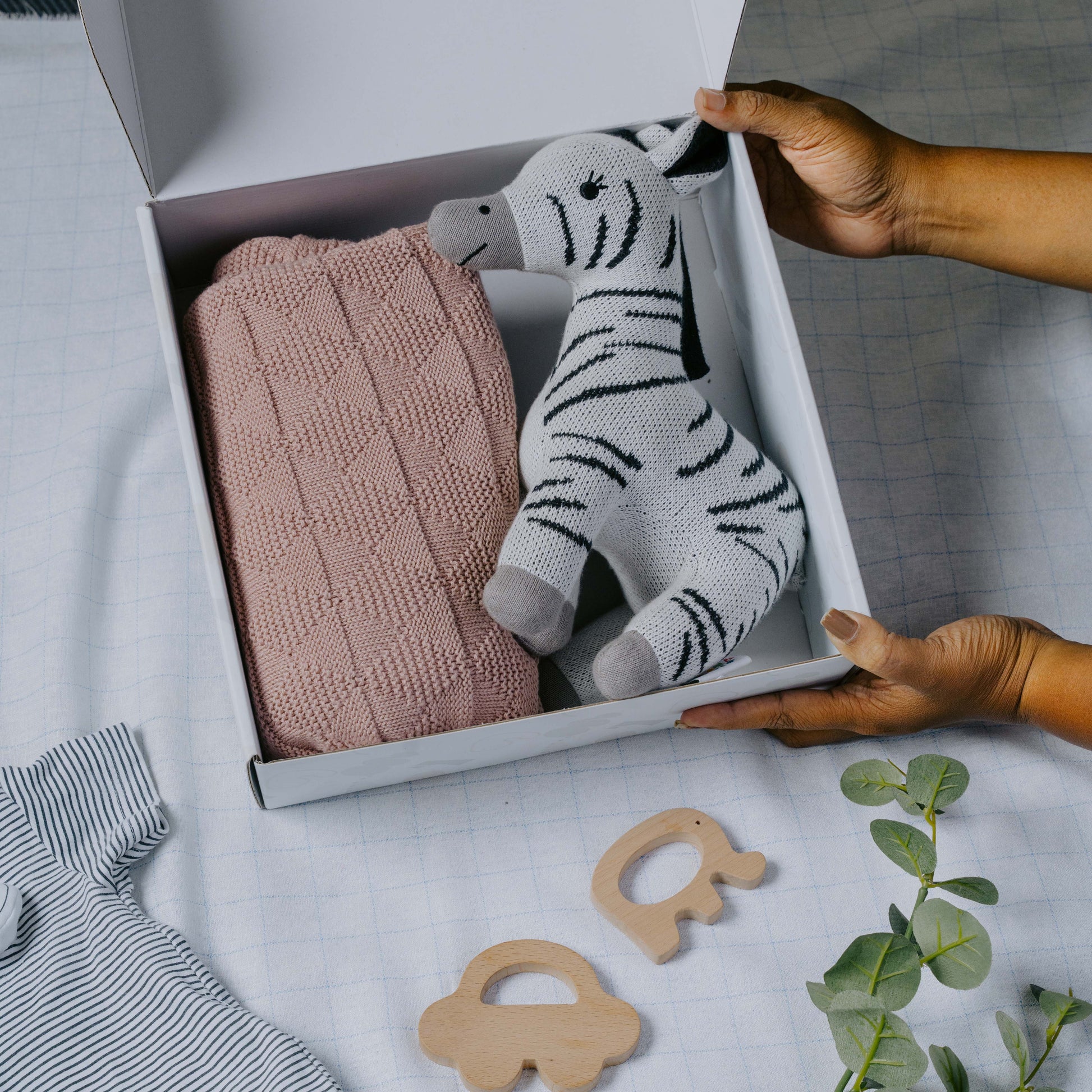 NESTA TOYS Newborn Gift Set – Swaddle, Zebra Plush Toy & Wooden Teethers - nestatoys