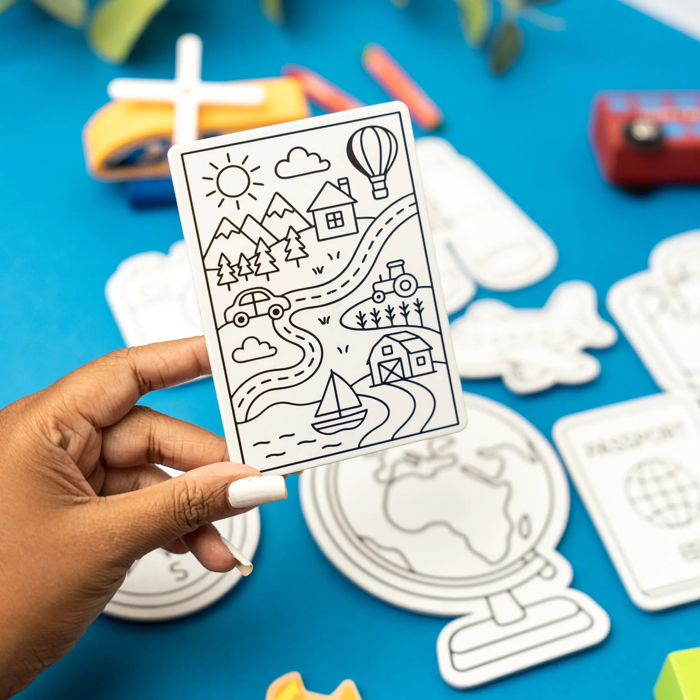 Set of 10 DIY World Explorer magnets for kids featuring colorful world and explorer designs, perfect for creative and educational fun