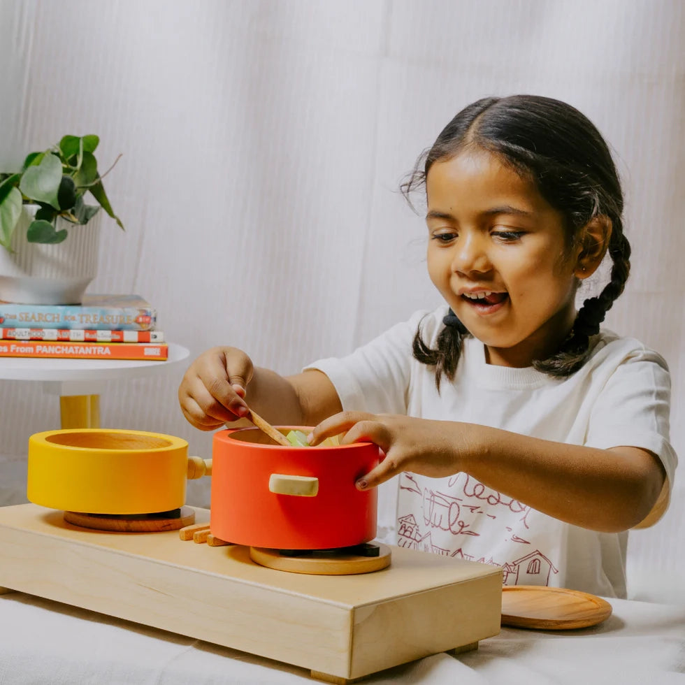 Kid playing with Wooden Kitchen Play Set 9 Pcs for creative role-play