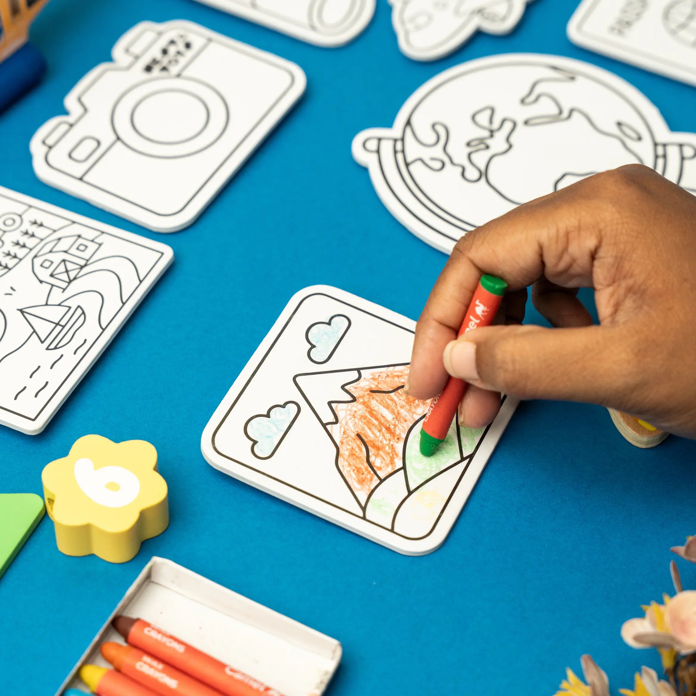 Set of 10 DIY World Explorer magnets for kids featuring colorful world and explorer designs, perfect for creative and educational fun