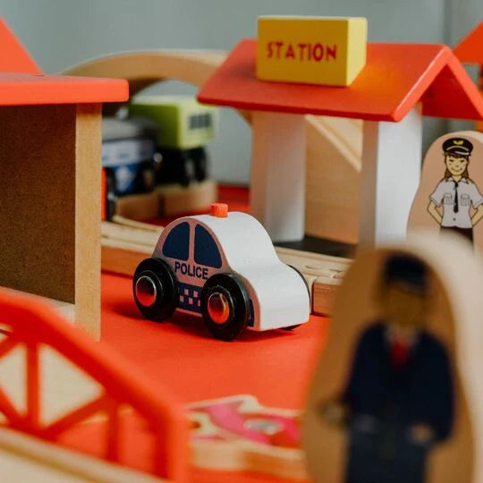 Wooden train track toy set with vehicles designed for creative and open-ended play